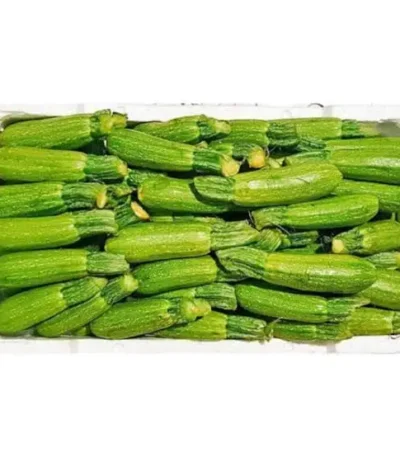 Box of fresh baby marrow vegetables, ideal for healthy cooking.