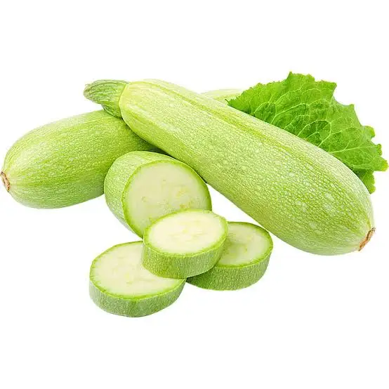 Baby marrow sliced, showing the fresh green vegetable and its texture.