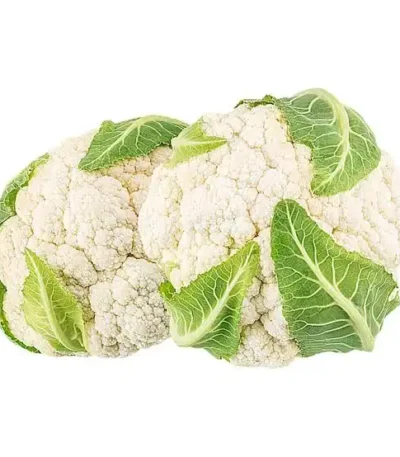 Two fresh white cauliflower heads with green leaves